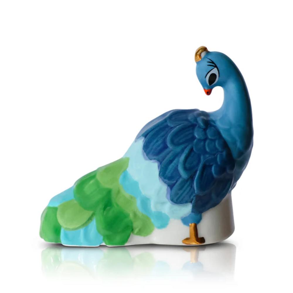Colorful peacock figurine mini  on a white background