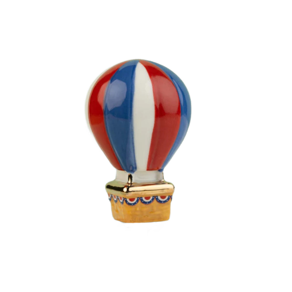 Colorful hot air balloon figurine mini decor on a white background