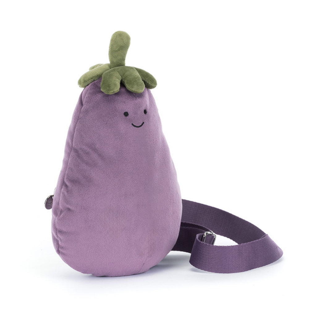 Plush toy shaped like an eggplant with a smiling face on a white background