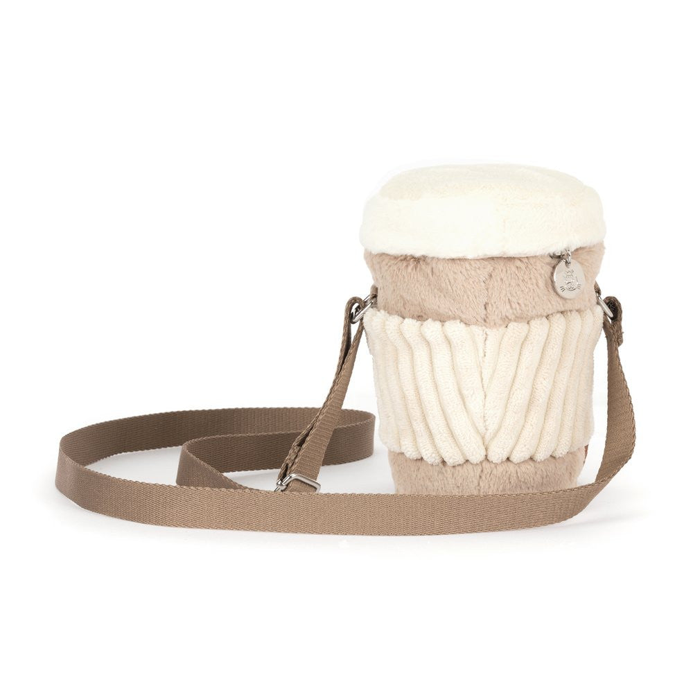 Small cylindrical bag with a fur-like texture and a white top on a white background