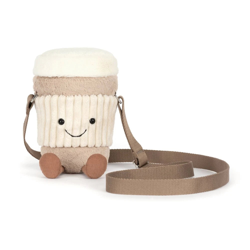Children's crossbody bag designed like a cup with a face on a white background