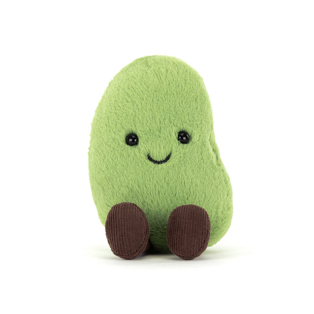 Green Soyella Bean plush toy with a smiling face and brown legs on a white background.