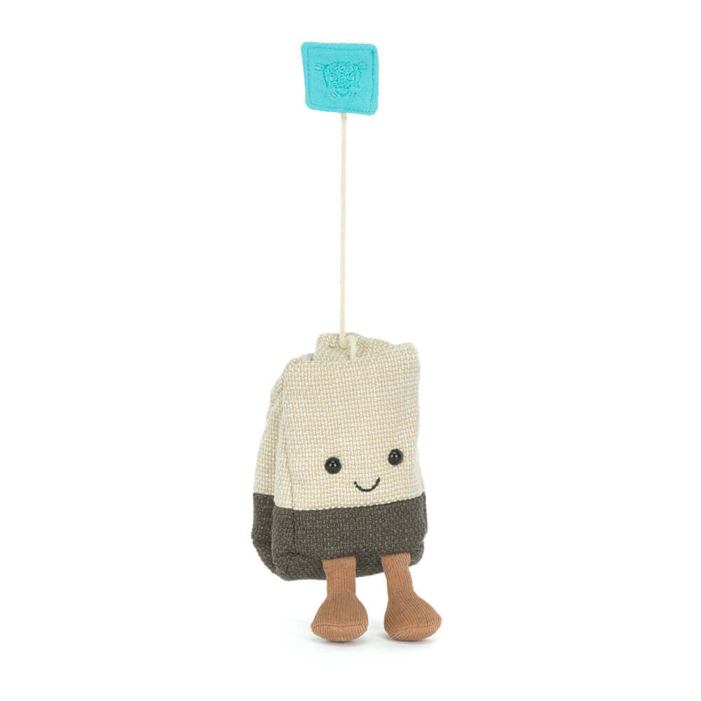 String pulled on the Steepy Tea Bag plush toy on a white backround. 