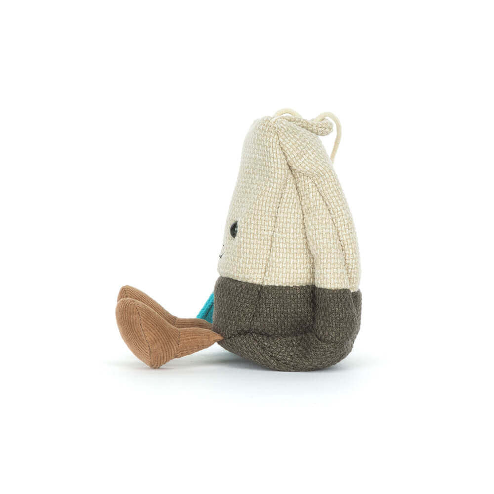 Side of the Steepy Tea Bag plush toy on a white backround. 