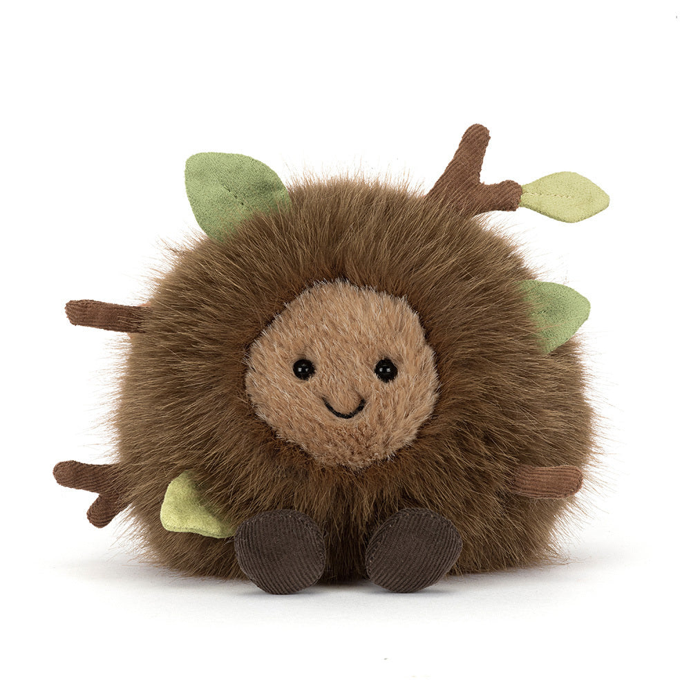 A front photo of a Mulshi Woodland Floor plush toy with a smiling face and brown legs on a white background.