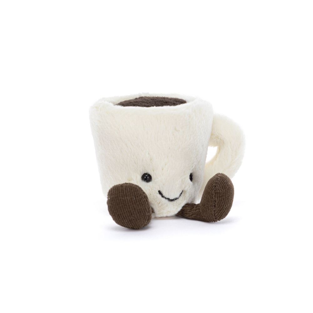Stuffed white Espresso Cup toy with a smiling face and brown legs on a white background.