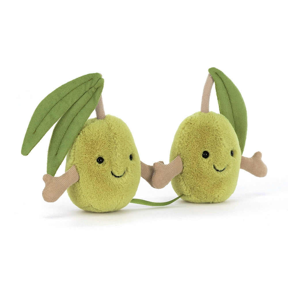Two green pair of olives plush toy with leafy green tops on a white background