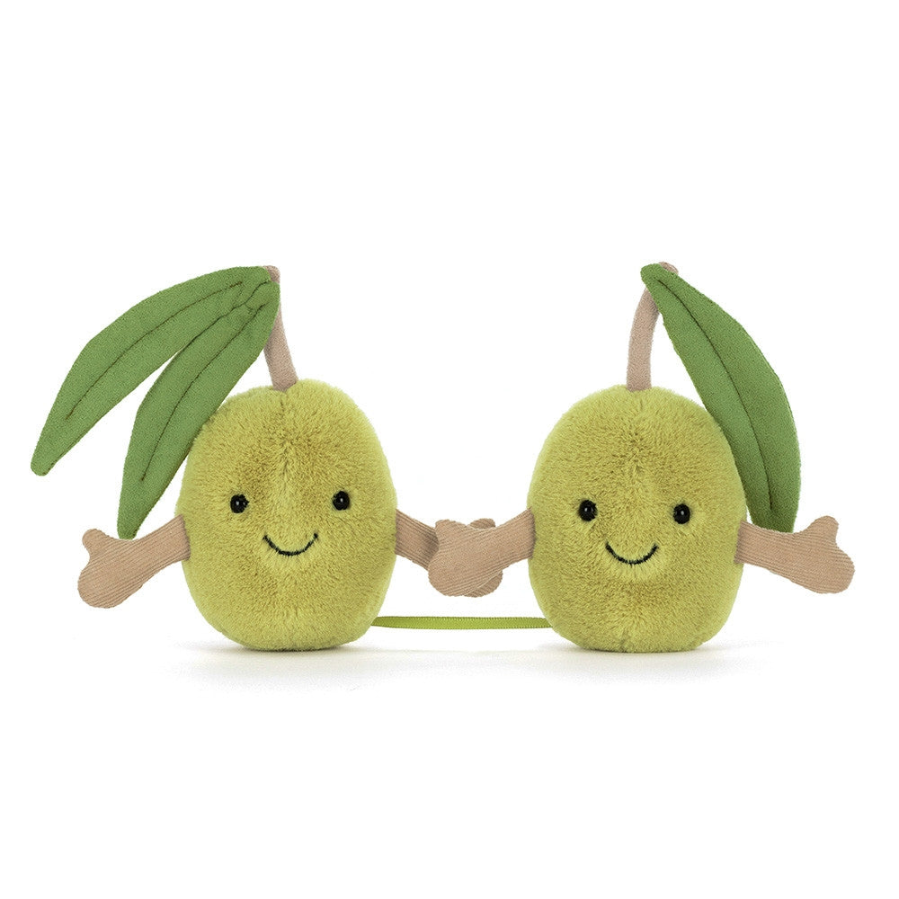 Front side facing photo of a green pair of olives plush toy with leafy green tops on a white background