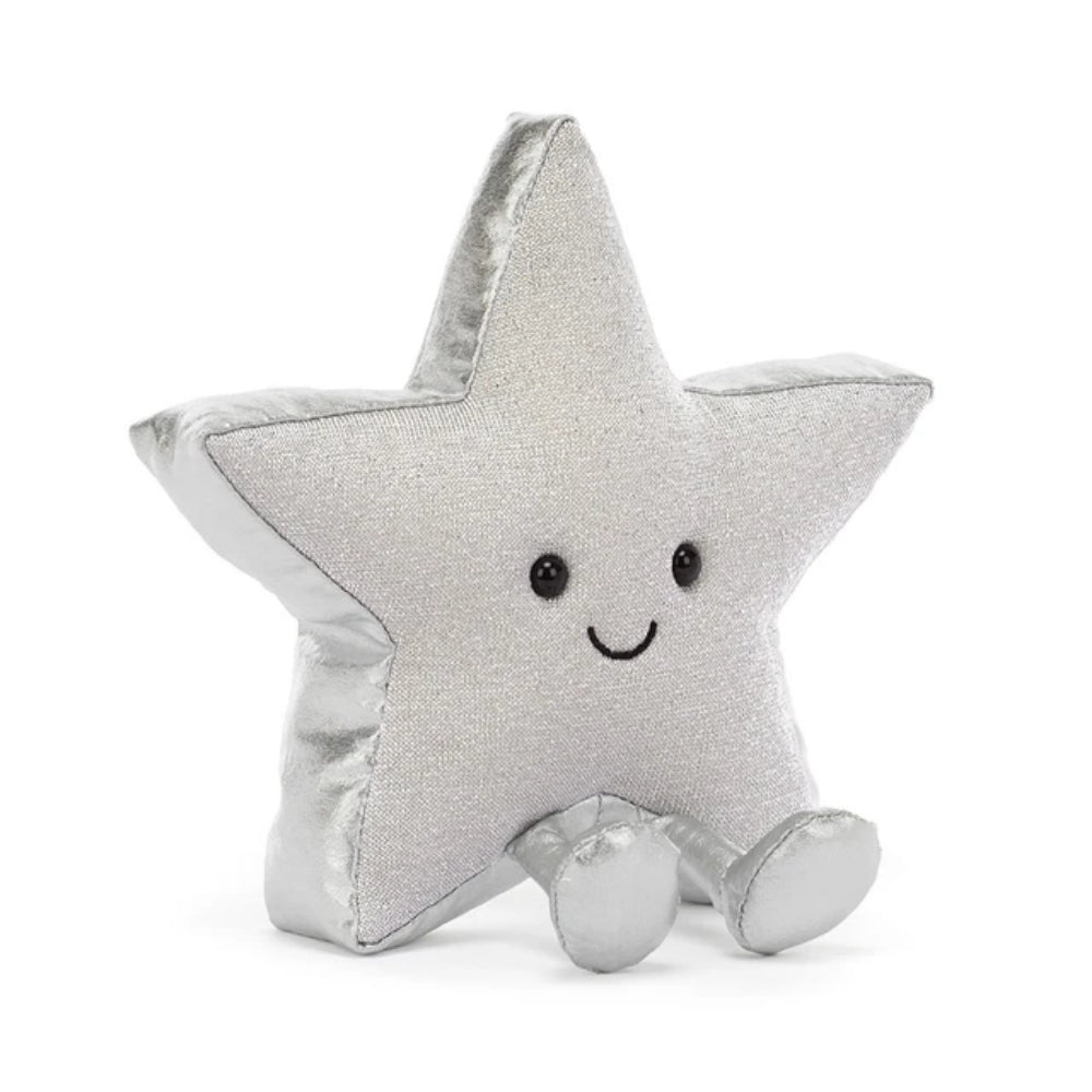 A silver glittery star-shaped plush toy with a smiling embroidered face and small feet, photographed on a clean white background.