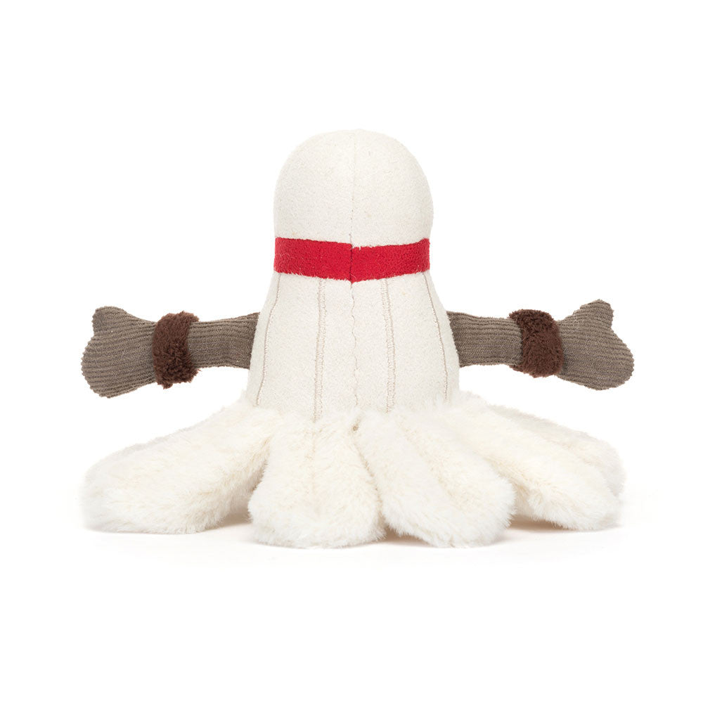 A photo of the back of a white plush toy resembling a badminton birdie with grey arms and a smily face on a white backround