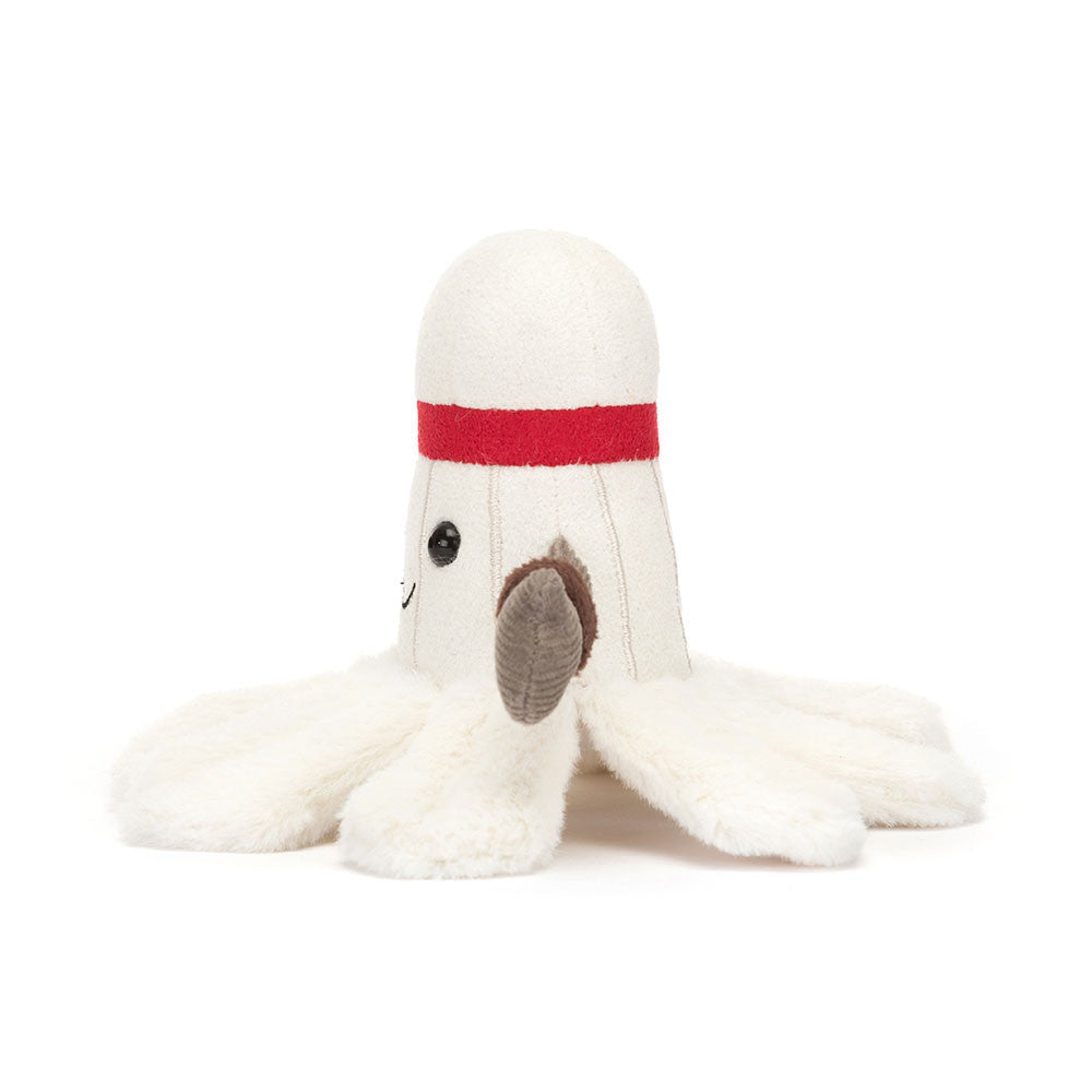 A side photo of a white plush toy resembling a badminton birdie with grey arms and a smily face on a white backround