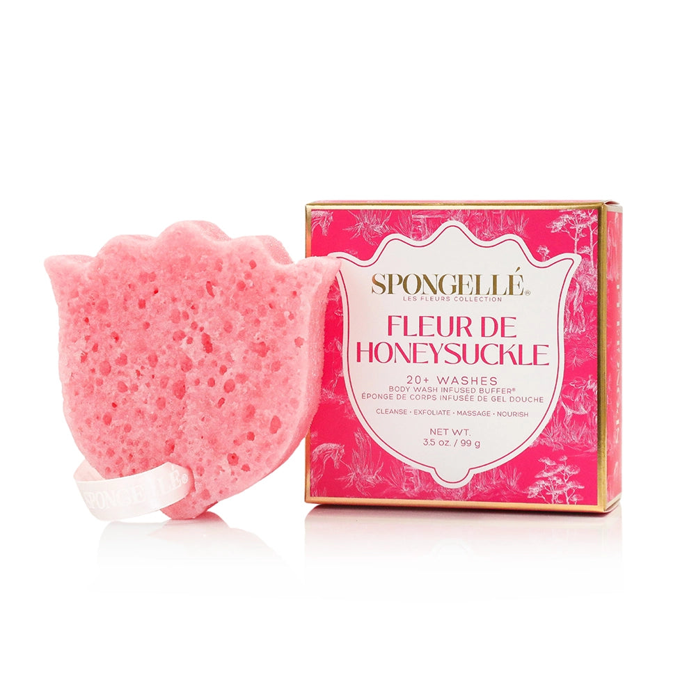 Pink bath sponge with packaging labeled 'Spongellé Fleur de Honeysuckle' on a white background