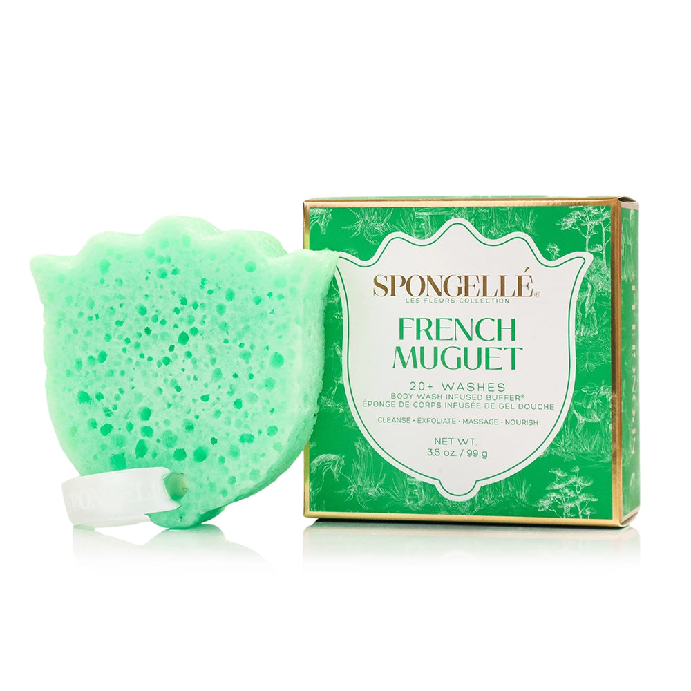 Green body wash sponge with packaging on a white background