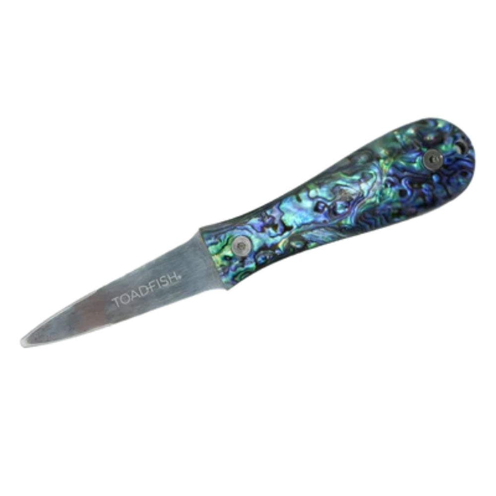 A small folding knife with a silver stainless steel blade and a handle made of iridescent abalone shell showing blue, green, and purple tones. The brand name 'TOADFISH' is printed on the blade.