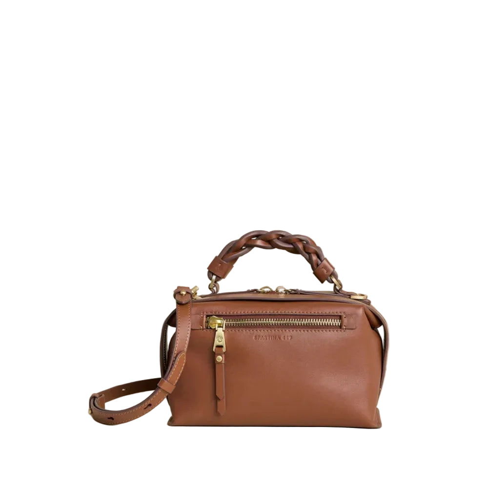A brown leather handbag with a braided top handle, gold-tone hardware, and a front zip pocket, photographed against a plain white background.
