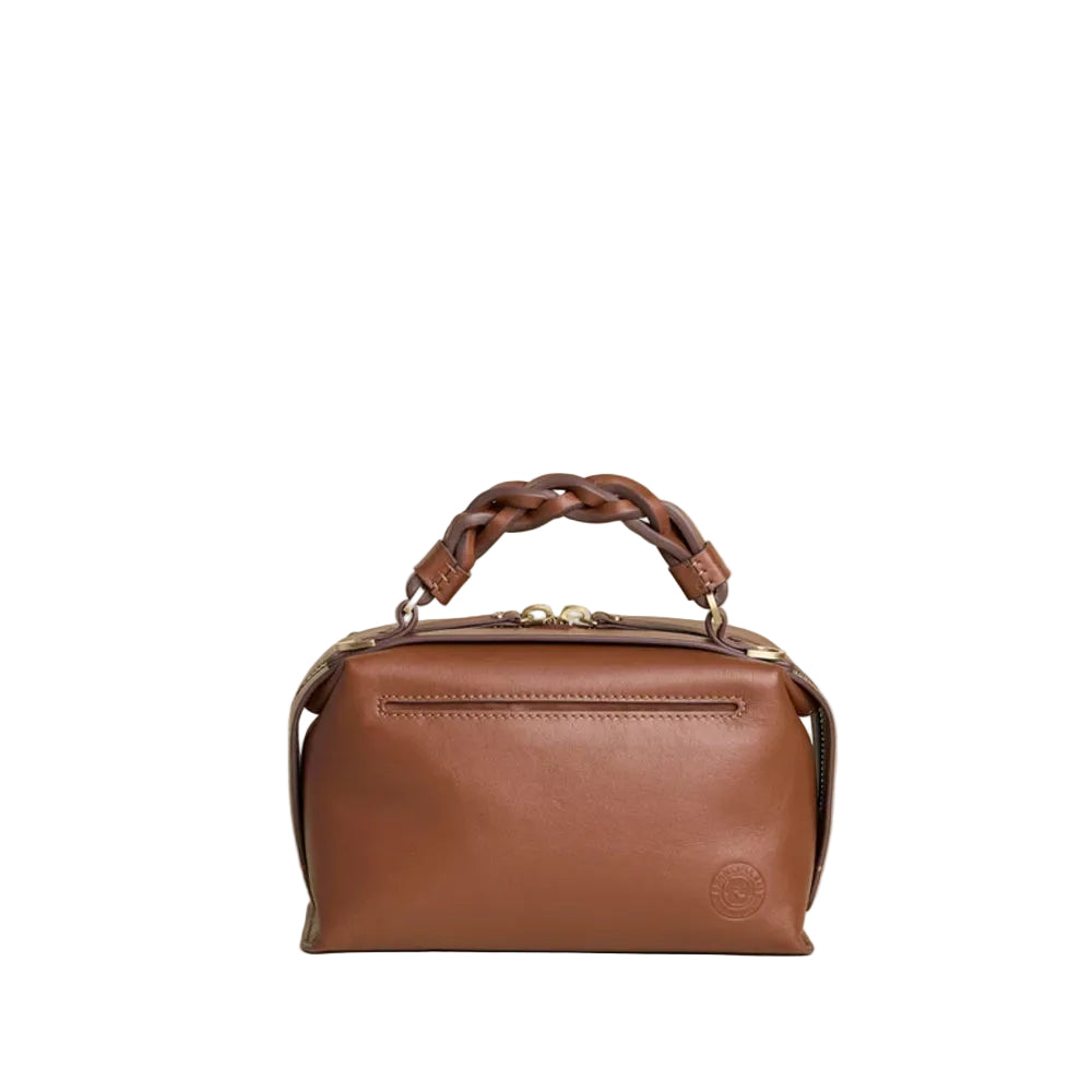 A brown leather top-handle satchel bag with a braided leather handle, shown against a solid white background.