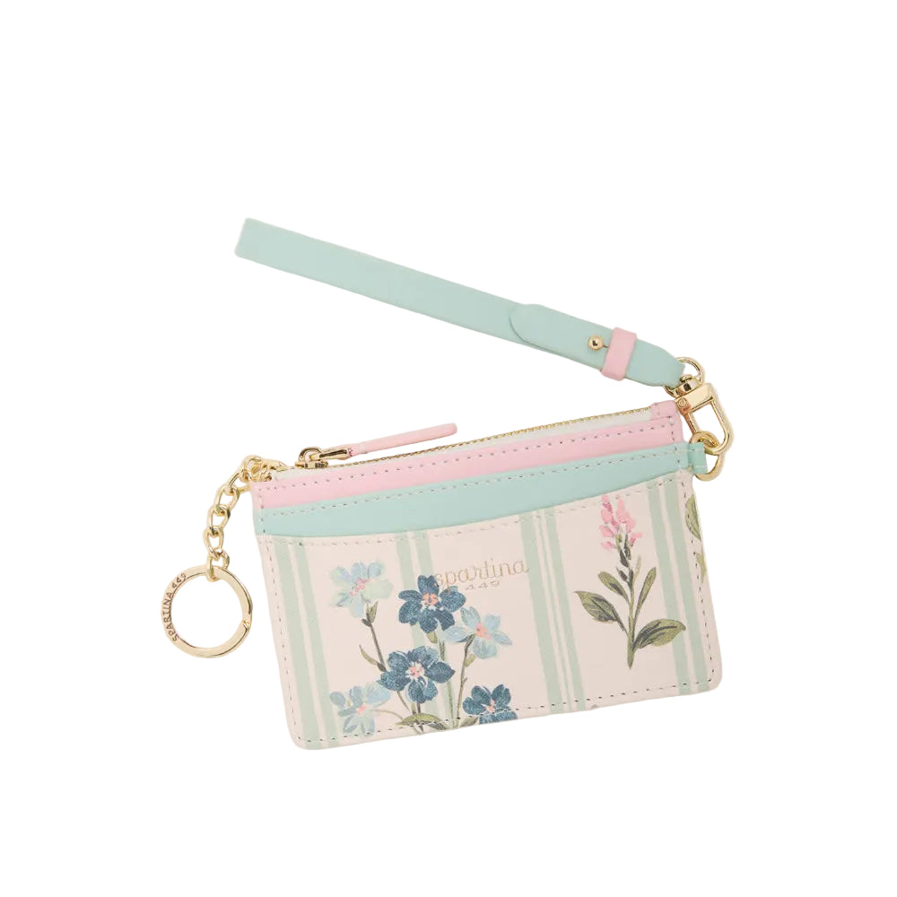 A pastel-colored card holder pouch with a wrist strap, featuring a floral print, green and pink stripes, and gold-tone hardware on a light cream background.