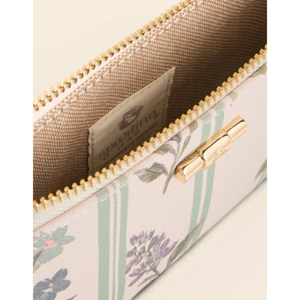 Close up of a pastel zip-around wallet with a floral and striped pattern, featuring a light blue base, gold-tone hardware.