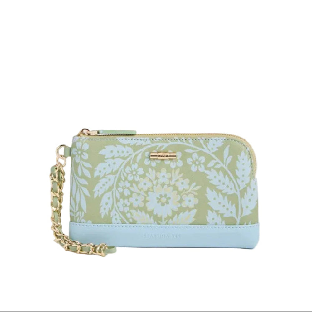 A small zip-around wristlet clutch featuring a sage green and light blue floral damask pattern, a solid light blue base, and a gold-tone chain strap.