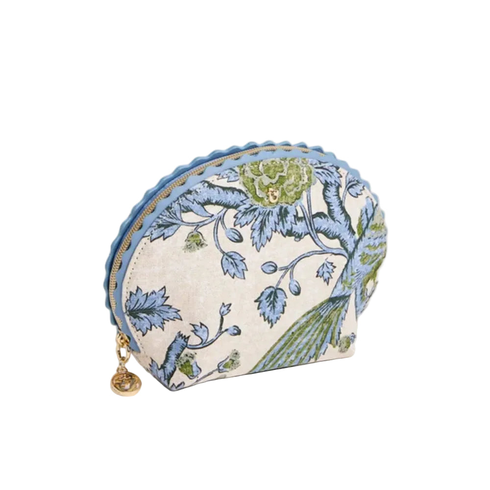A small semi-circular zip pouch with a blue and green floral pattern on a cream background, featuring a scalloped blue edge and a small gold charm.