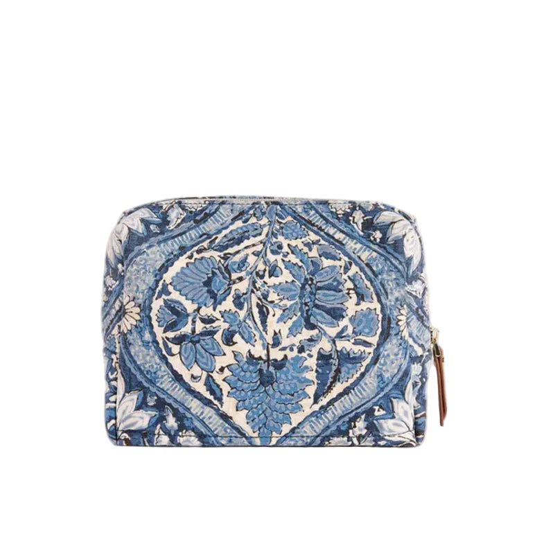 A small zippered cosmetic pouch with a blue and white floral mandala pattern, shown on a plain beige background.