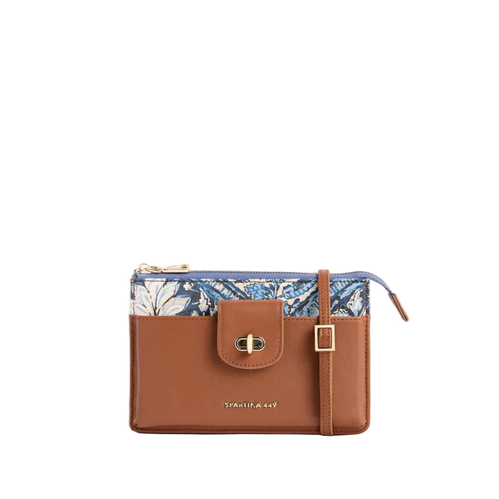 A brown leather zip-around pouch wallet with a blue and white floral patterned top section, a front flap pocket with a turn-lock closure, and a vertical strap with a gold buckle, shown on a white background.
