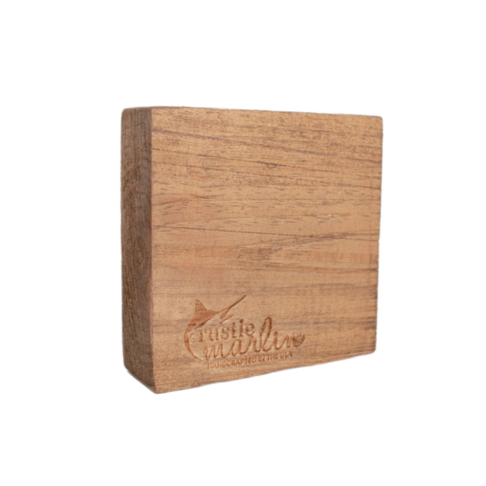 Back of a navy blue/brown wood  square  decorative block sign with motivational quote in white text that reads " Life Doesn't come With A Manual It Comes With A Dad"   on a white background