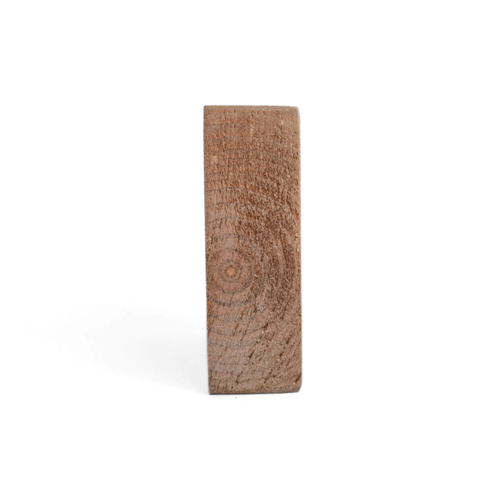Side of a brown square  wooden block on a white background