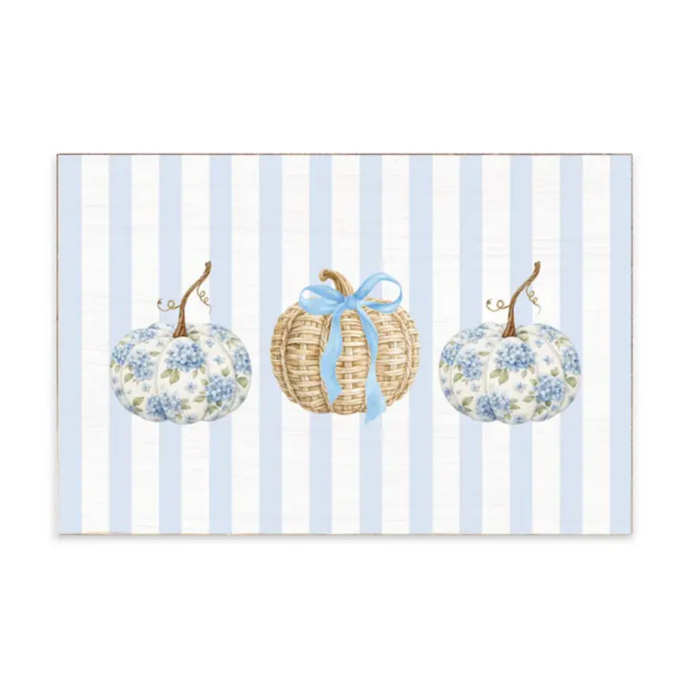 A decorative decor plaque with pumpkins and blue stripe colors on a white background. 