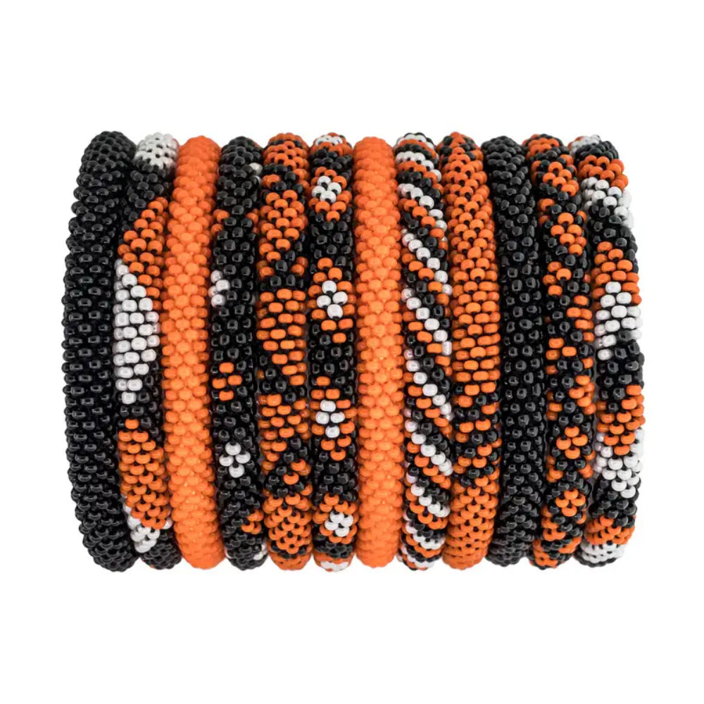 Set of colorful beaded bracelets on a white background