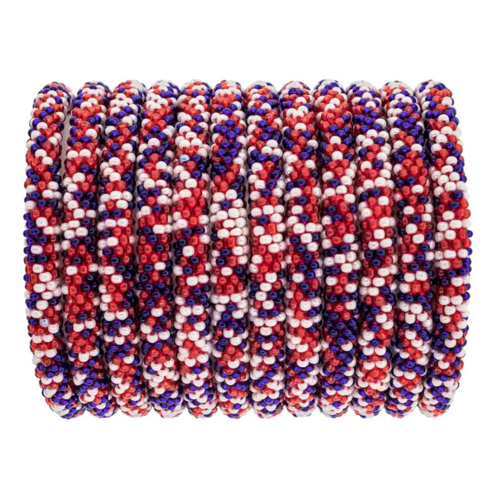 Red, white, and blue beaded bracelets, speckled style on white background. 