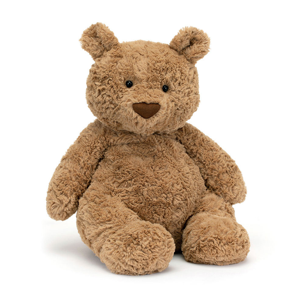 A medium size beige teddy bear sitting upright on a white backround.