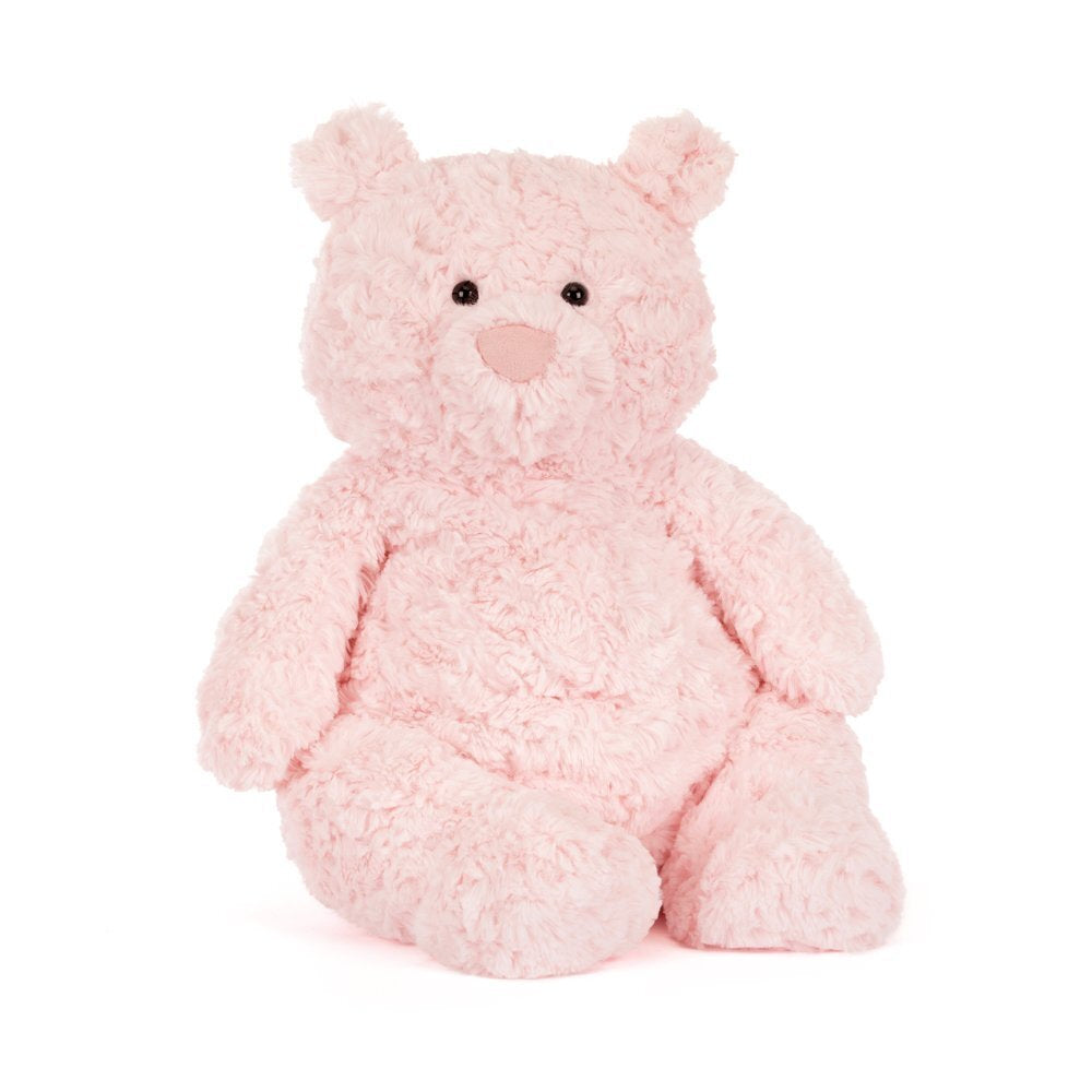 Pink teddy bear on a white background.