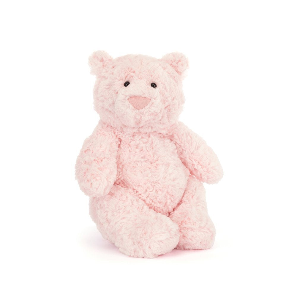 An side angled photo of a pink teddy bear plush toy on a white background