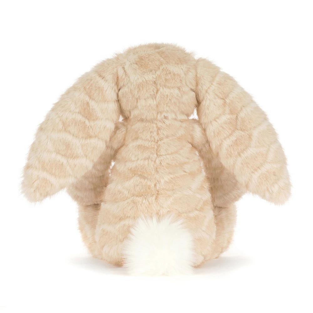 A beige plush bunny toy shown from the back, featuring long floppy ears, a textured faux-fur body, and a fluffy white tail on a plain white background.