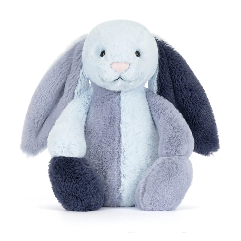  A colorful blue striped bunny in differant shades of blue on a white backround 