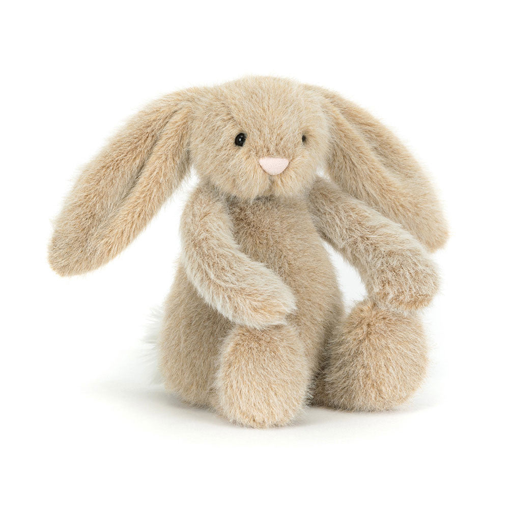Oat plush toy bunnie with a soft beige color and long ears on a white background.