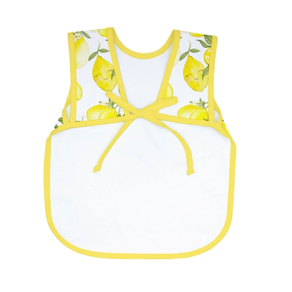 White apron with yellow lemon pattern on a white background