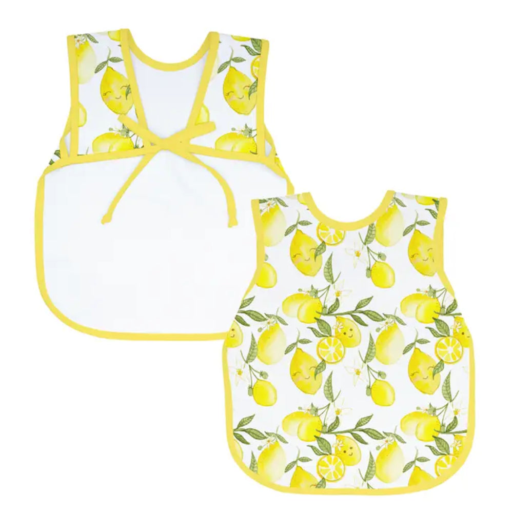 Two children's aprons with lemon pattern on a white background