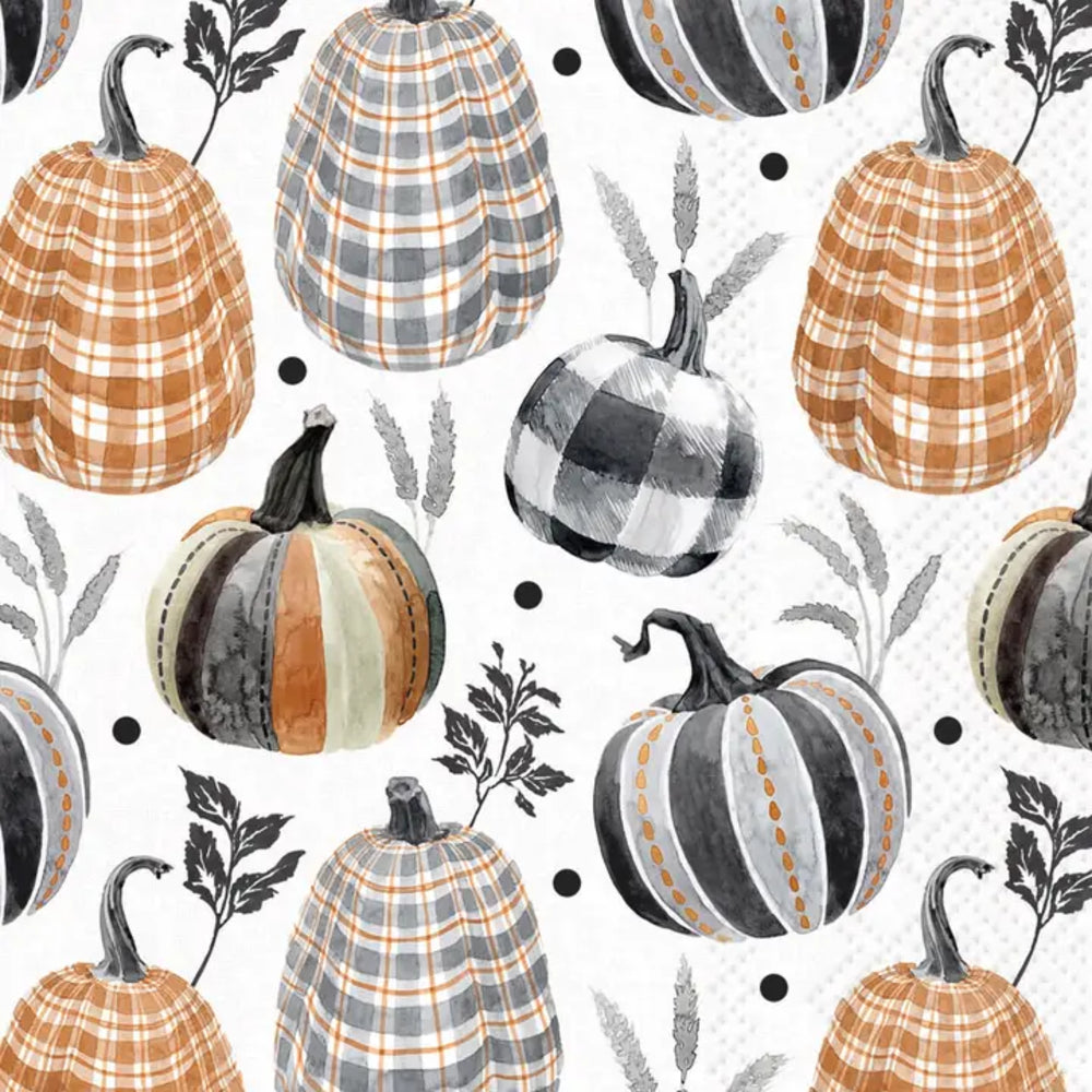 A repeating autumn pattern featuring illustrated pumpkins in orange, gray, black, and white, with plaid, striped, and buffalo-check designs on a white background with small black dots.