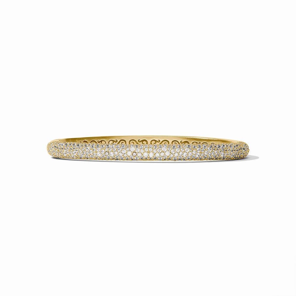 Gold bracelet with small stones on a white background