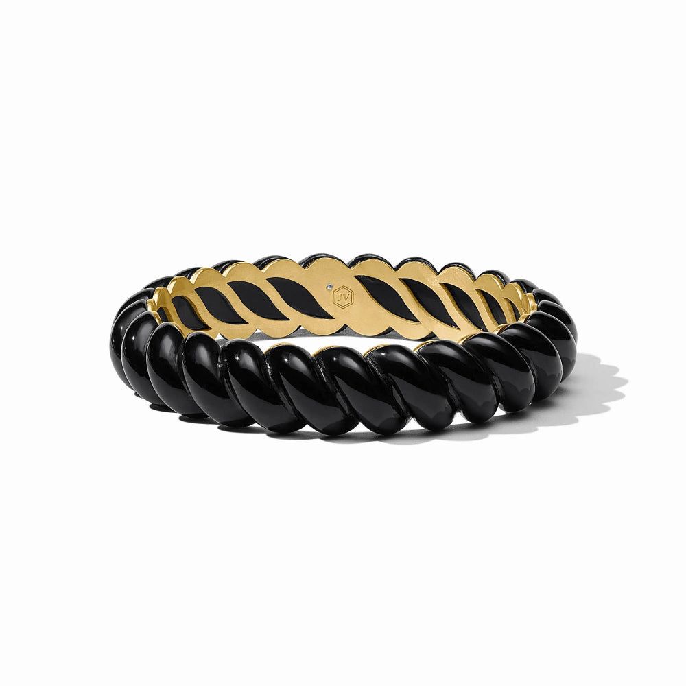 A twisted black and gold bangle bracelet on a clean white background.