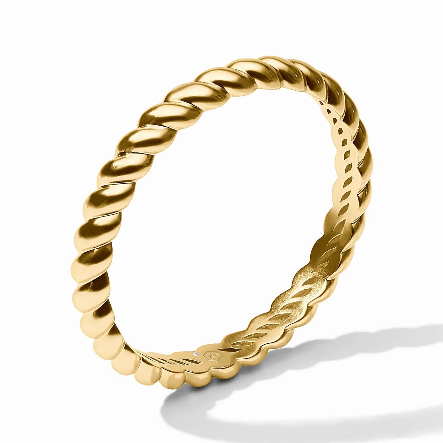 Rope Textured Gold Tone Bangle on a White Background