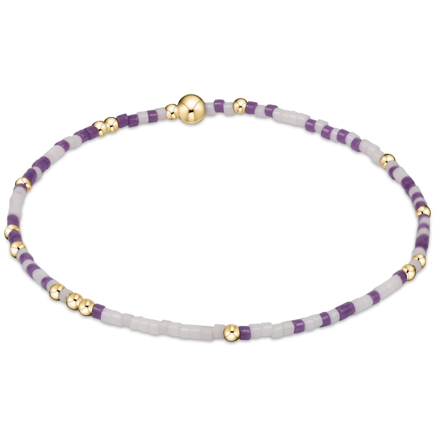Bracelet with purple, white and gold beads on a white background
