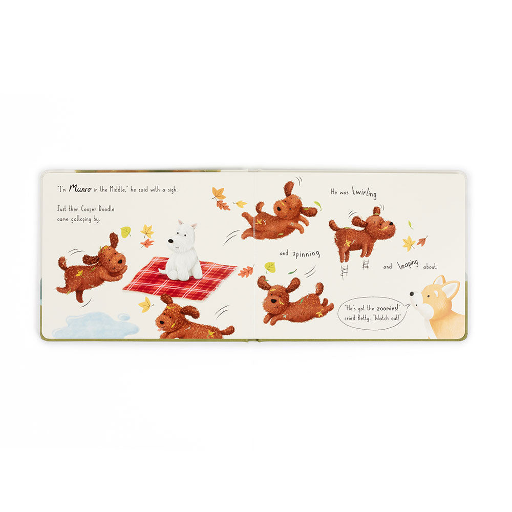 Children's book page with illustrations of dogs and a doghouse on a white background