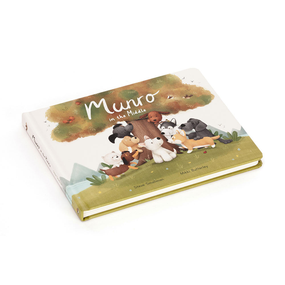 Book titled 'Munro in the Middle' with illustrations of animals on a white background
