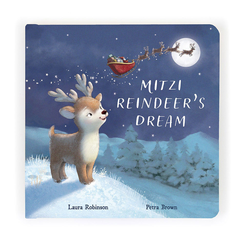 Book cover of 'Mitzi Reindeer's Dream' with a reindeer in the snow and Santa Claus in the sky.