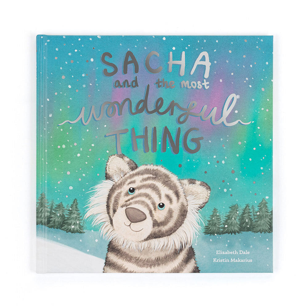 Book cover of 'Sacha and the Most Wonderful Thing' with a tiger illustration and snowy landscape.