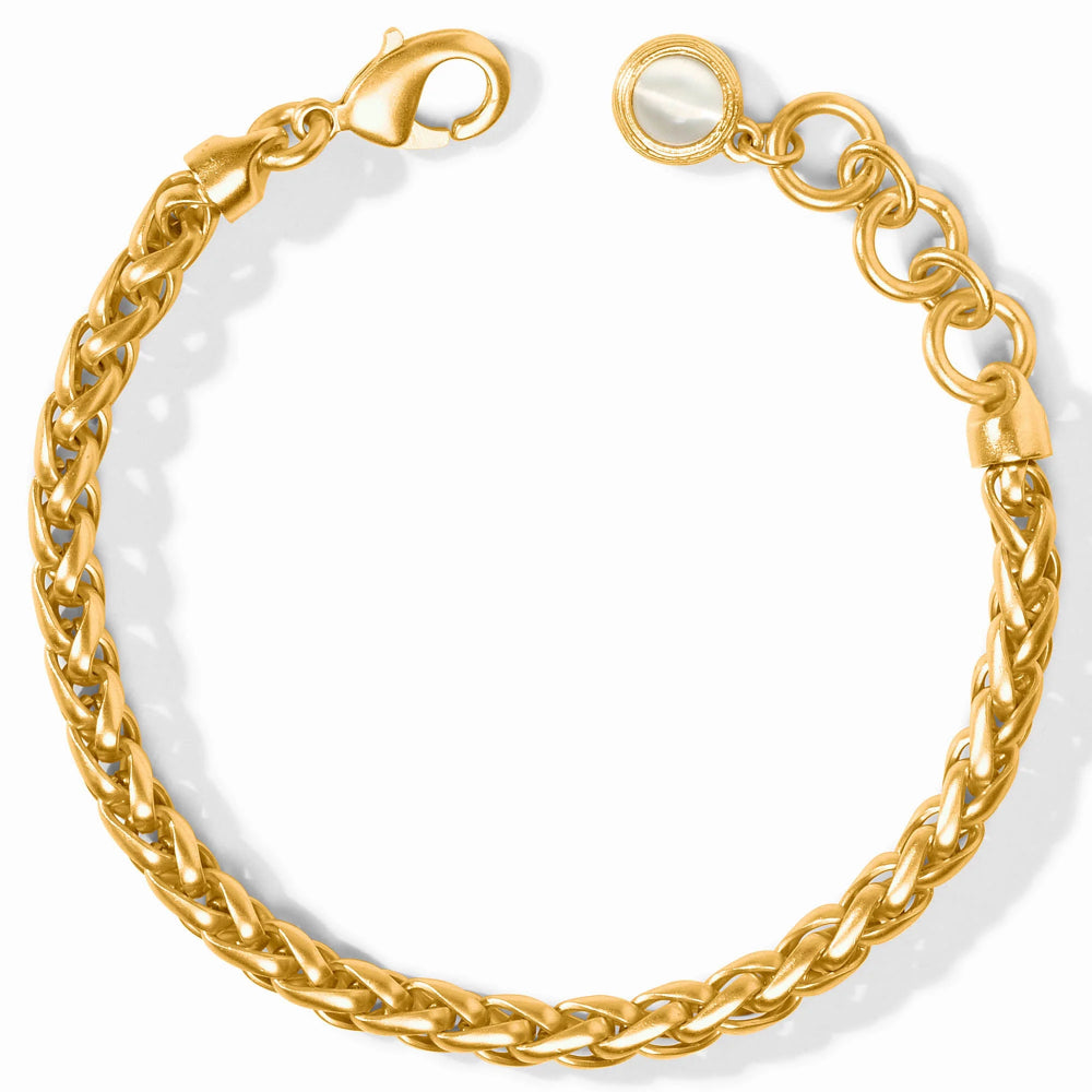 A gold-toned braided chain bracelet with a lobster clasp and extension links, shown on a clean white background.