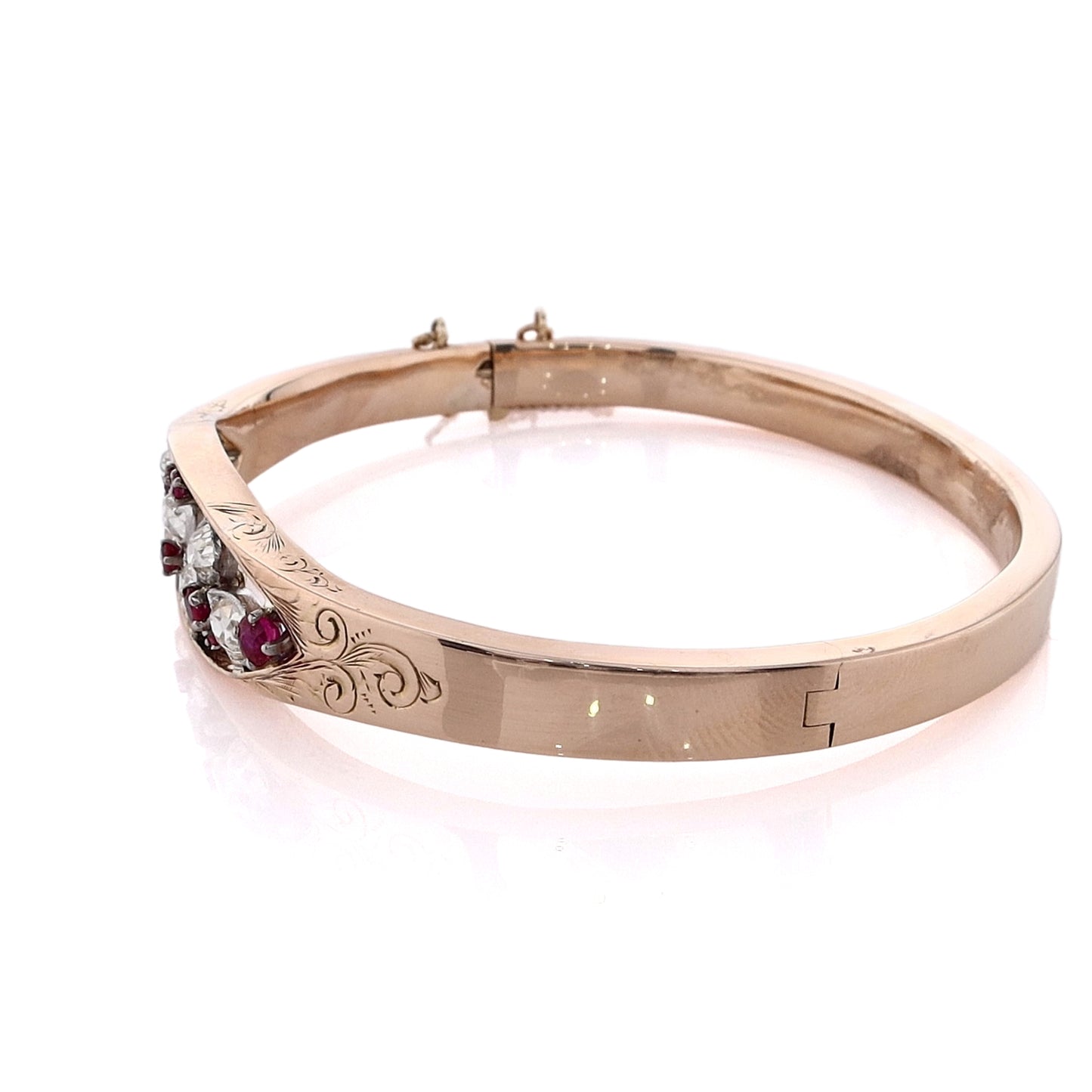 Estate 14 Karat Yellow Gold Engraved Diamond and Ruby Hinged Bangle Bracelet